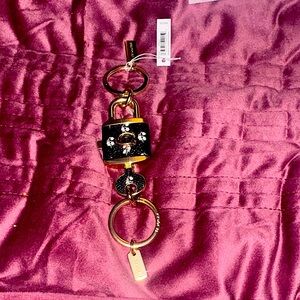 Coach Black and Gold Key Holder with Floral Design F76451